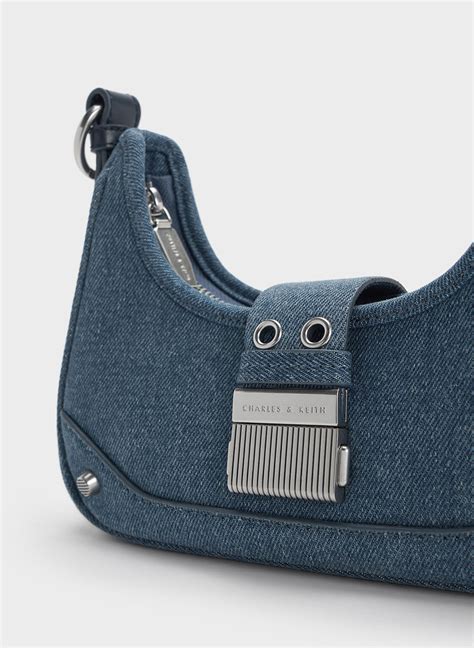 Blue Winslet Denim Belted Hobo Bag .